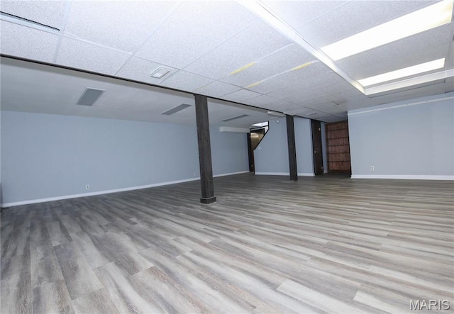 12530 Trammell Ct, Creve Coeur, MO 63141 - finished basement featuring baseboards, a paneled ceiling, and wood finished floors