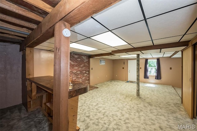 basement with carpet flooring
