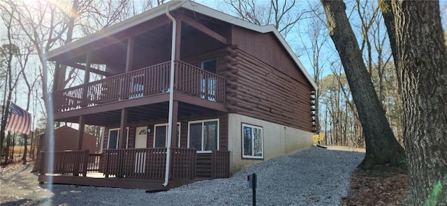 13559 Kitt Park Dr, Saint Genevieve, MO 63670 - view of side of home with log exterior and a wooden deck