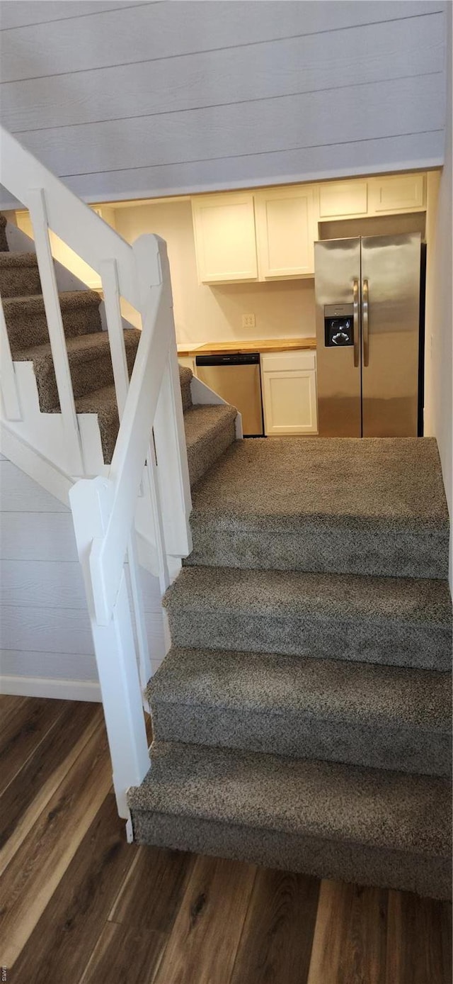 13559 Kitt Park Dr, Saint Genevieve, MO 63670 - stairway with wood finished floors and baseboards