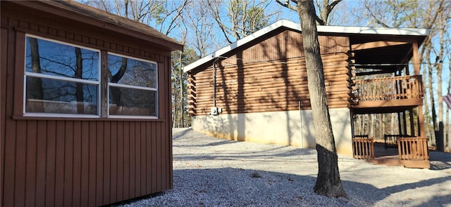 13559 Kitt Park Dr, Saint Genevieve, MO 63670 - view of side of property with log siding