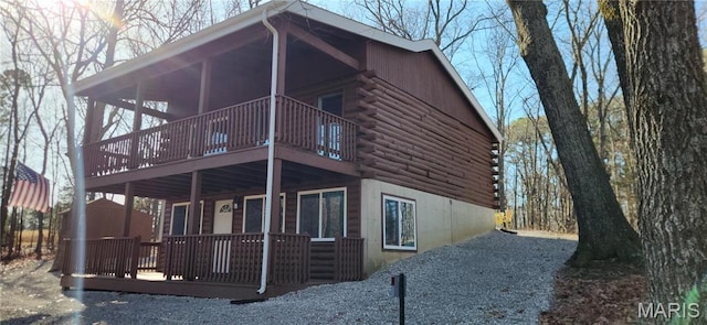 13559 Kitt Park Dr, Saint Genevieve, MO 63670 - view of side of home with log siding and a deck