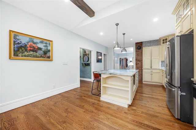 kitchen featuring freestanding refrigerator, cream cabinets, open shelves, light wood-style flooring, and recessed lighting