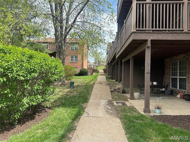 view of property's community featuring a patio