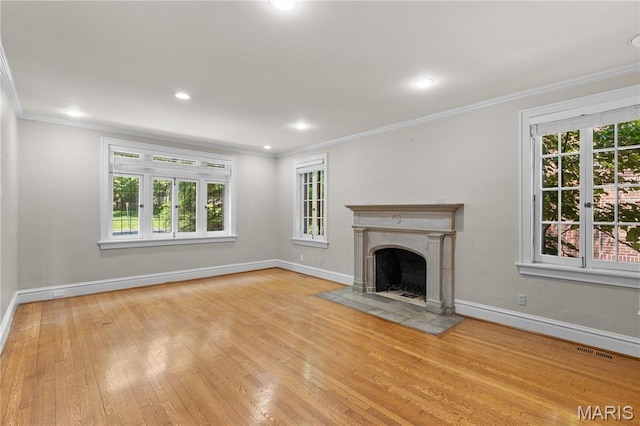 46 Broadview Dr, Clayton, MO 63105 - unfurnished living room with ornamental molding, hardwood / wood-style floors, a fireplace, and recessed lighting