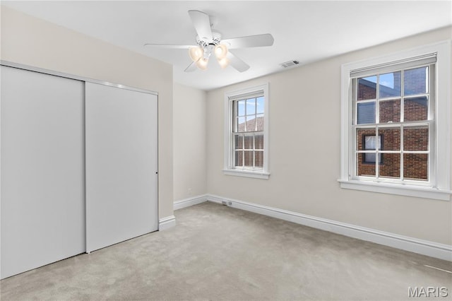 46 Broadview Dr, Clayton, MO 63105 - unfurnished bedroom with carpet floors, a closet, and ceiling fan