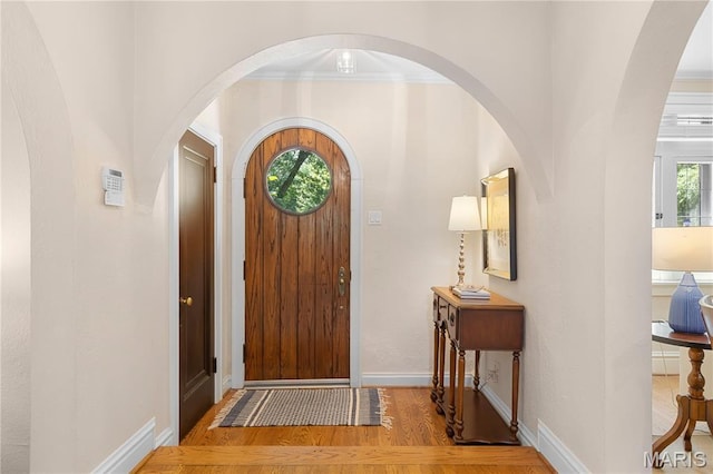 46 Broadview Dr, Clayton, MO 63105 - foyer featuring arched walkways and wood finished floors