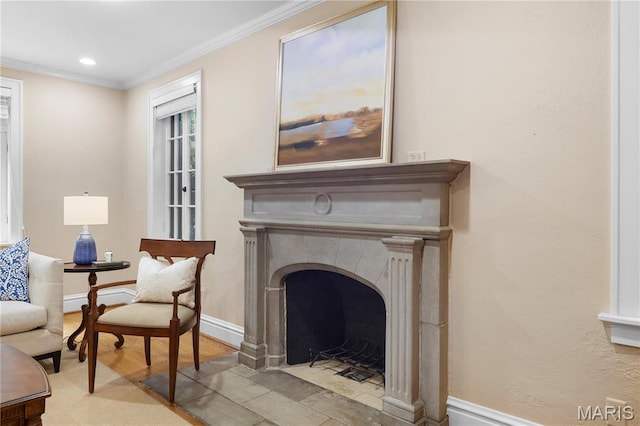 46 Broadview Dr, Clayton, MO 63105 - living area with ornamental molding, recessed lighting, a fireplace with flush hearth, and wood finished floors