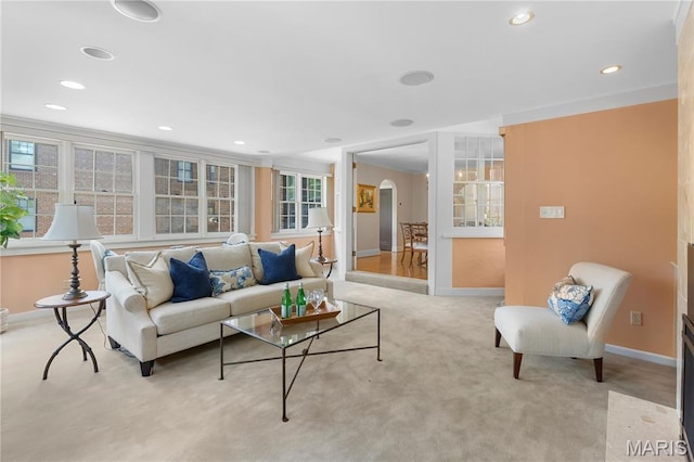 46 Broadview Dr, Clayton, MO 63105 - living room featuring arched walkways, light carpet, and recessed lighting