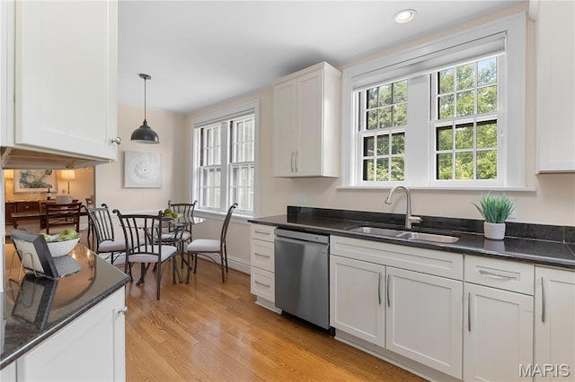 46 Broadview Dr, Clayton, MO 63105 - kitchen featuring dishwasher, healthy amount of natural light, light wood-style flooring, white cabinets, and recessed lighting