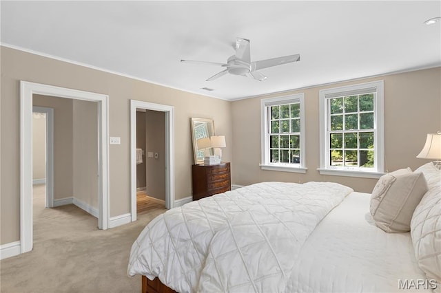 46 Broadview Dr, Clayton, MO 63105 - bedroom with light colored carpet, ceiling fan, and crown molding