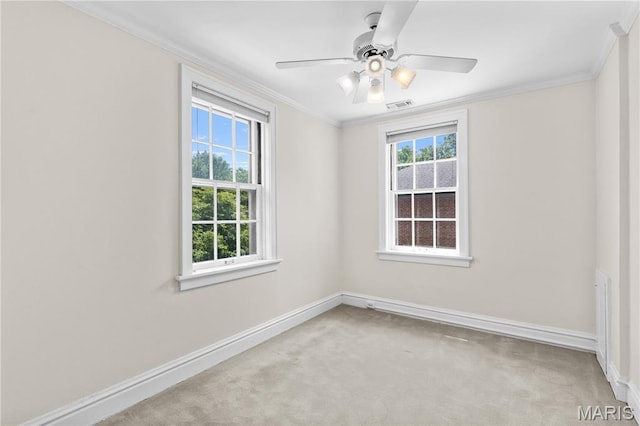 46 Broadview Dr, Clayton, MO 63105 - spare room featuring plenty of natural light, carpet floors, ornamental molding, and ceiling fan
