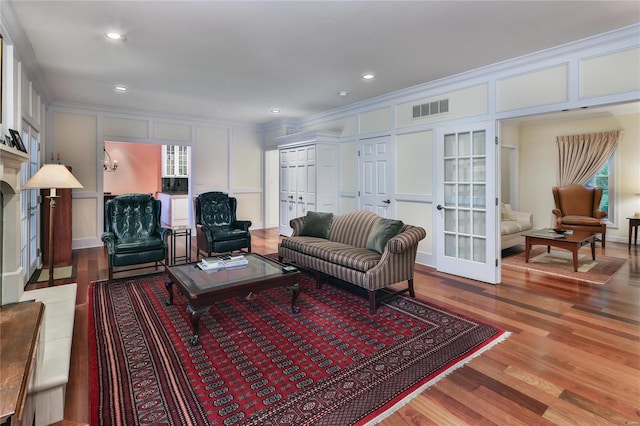 14643 Chermoore Dr, Chesterfield, MO 63017 - living room with a decorative wall, crown molding, french doors, wood finished floors, and recessed lighting