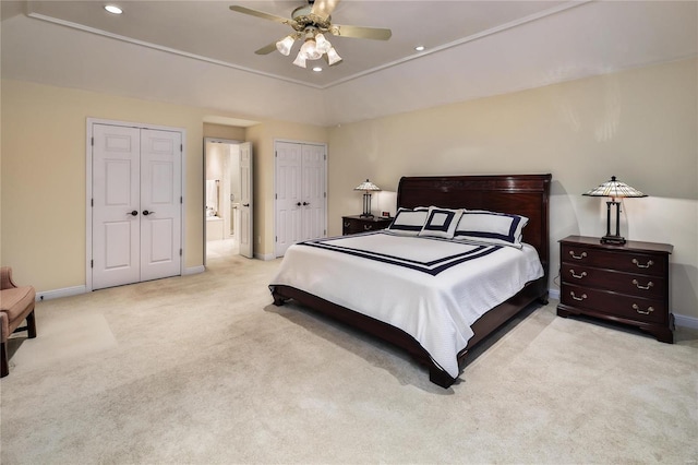 14643 Chermoore Dr, Chesterfield, MO 63017 - bedroom featuring light colored carpet, baseboards, recessed lighting, two closets, and ceiling fan