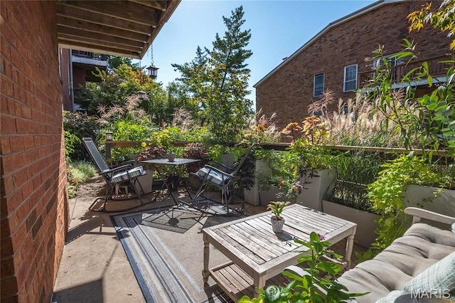 view of patio featuring outdoor dining space