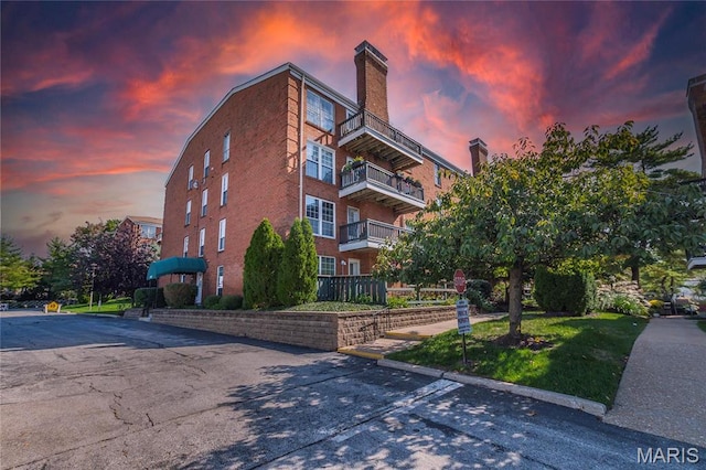view of property at dusk