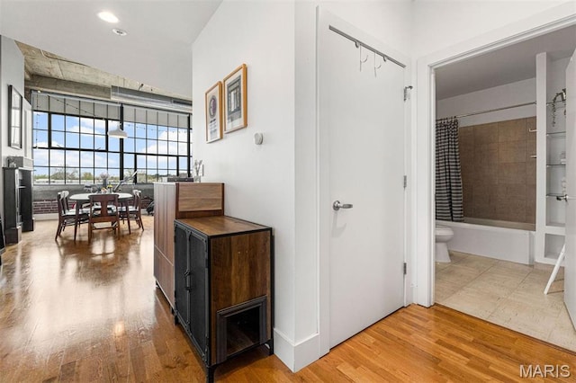 4100 Forest Park Ave Unit 403, Saint Louis, MO 63108 - corridor with wood finished floors and recessed lighting