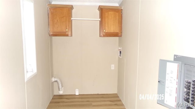 610 E Green St, Mascoutah, IL 62258 - washroom with cabinet space, hookup for a washing machine, and light wood finished floors