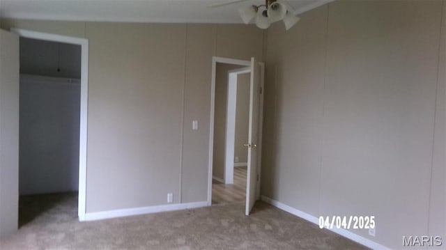 610 E Green St, Mascoutah, IL 62258 - unfurnished bedroom with carpet, a walk in closet, and a closet