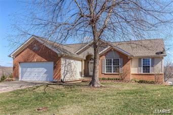 911 Valse Ct, Lake St Louis, MO 63367 - single story home featuring an attached garage, concrete driveway, and a front yard