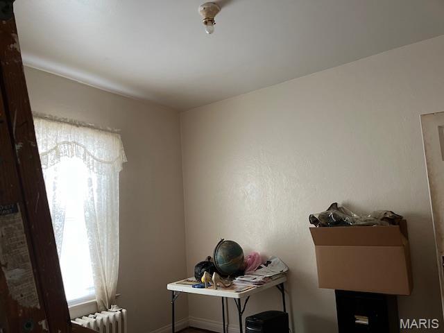 2412 Switzer, Saint Louis, MO 63136 - miscellaneous room featuring radiator and baseboards