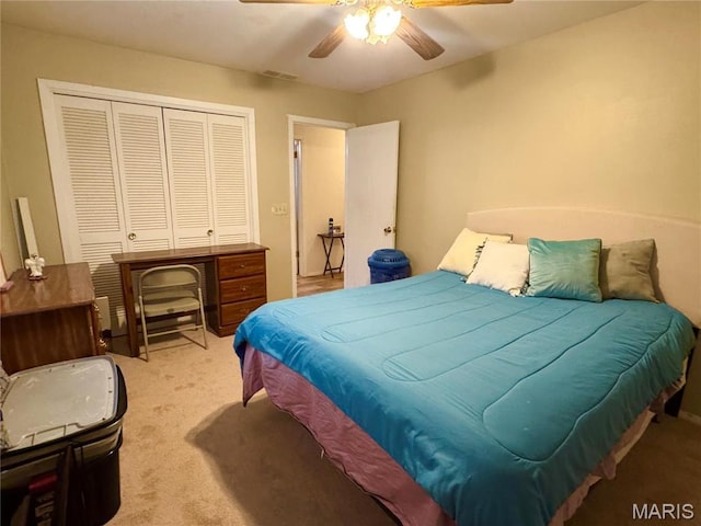 2101 Meadows Rd, Poplar Bluff, MO 63901 - bedroom with carpet floors, a closet, and a ceiling fan