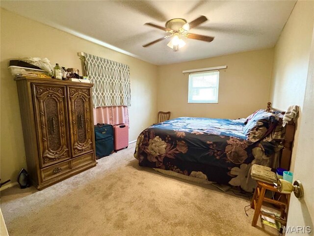 2101 Meadows Rd, Poplar Bluff, MO 63901 - carpeted bedroom with a ceiling fan