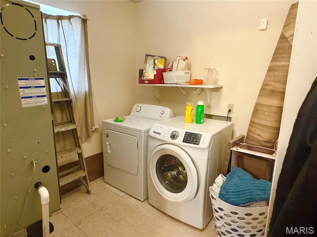 2101 Meadows Rd, Poplar Bluff, MO 63901 - laundry room featuring washing machine and clothes dryer and light flooring