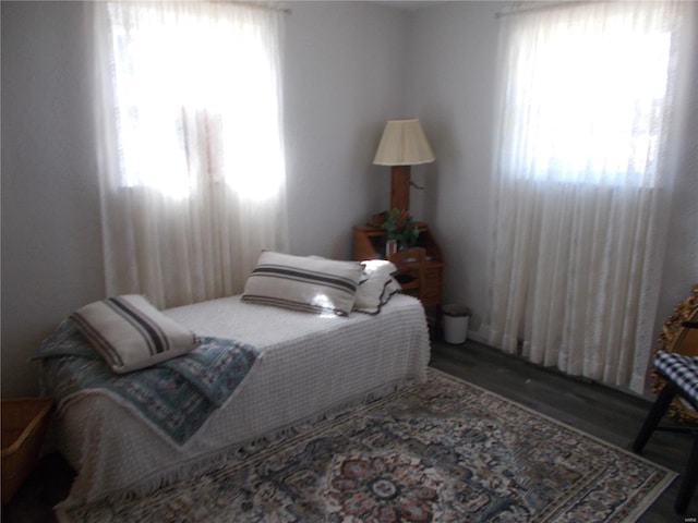 bedroom featuring wood finished floors