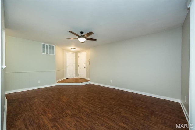 711 Lofty Point Dr Unit B, Ballwin, MO 63021 - spare room featuring ceiling fan, dark wood-type flooring, and baseboards