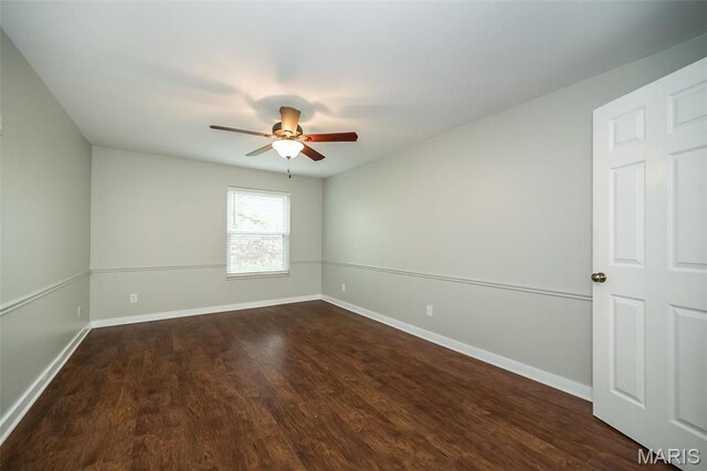 711 Lofty Point Dr Unit B, Ballwin, MO 63021 - spare room with ceiling fan, wood finished floors, and baseboards