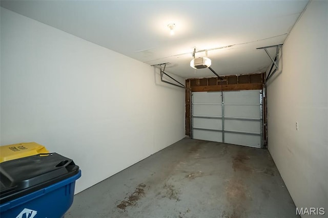 711 Lofty Point Dr Unit B, Ballwin, MO 63021 - garage featuring a garage door opener