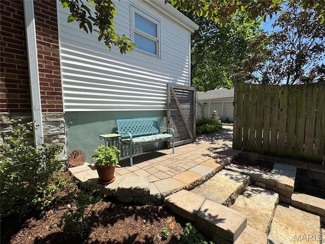 6060 Oleatha Ave, Saint Louis, MO 63139 - view of patio / terrace with fence