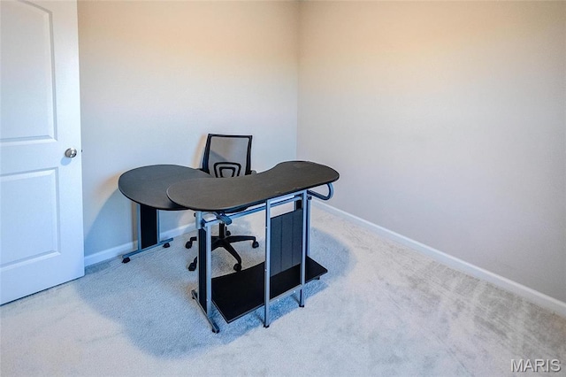 office space featuring carpet and baseboards