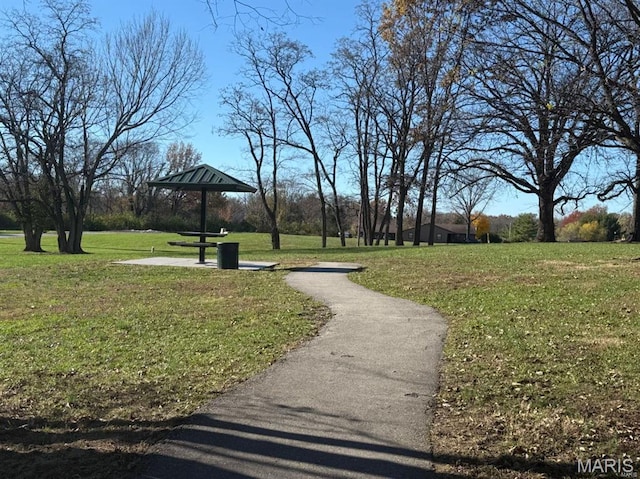 surrounding community with a lawn