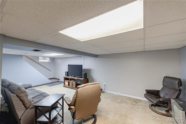890 Tyson Dr, Florissant, MO 63031 - living area featuring a paneled ceiling, carpet, baseboards, and stairway