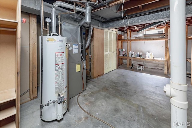 890 Tyson Dr, Florissant, MO 63031 - unfinished below grade area featuring water heater and heating unit