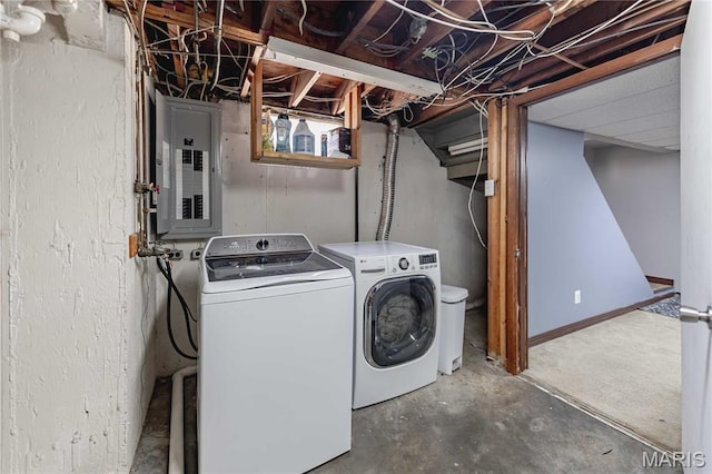 890 Tyson Dr, Florissant, MO 63031 - clothes washing area with washer and clothes dryer and electric panel