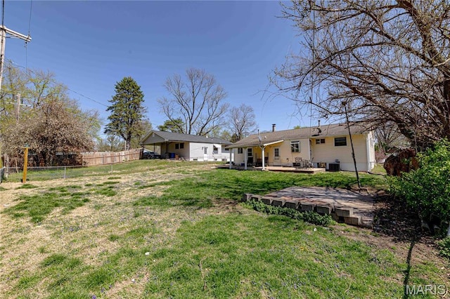 890 Tyson Dr, Florissant, MO 63031 - view of yard with central air condition unit and a wooden deck