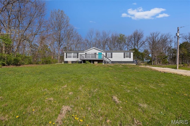 29 Pine Ln, Cedar Hill, MO 63016 - manufactured / mobile home featuring a wooden deck and a front lawn