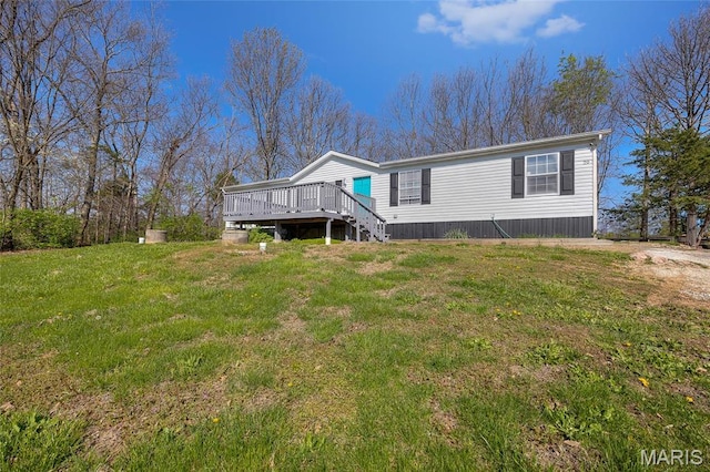 29 Pine Ln, Cedar Hill, MO 63016 - view of front of home with a deck, a front lawn, and stairway