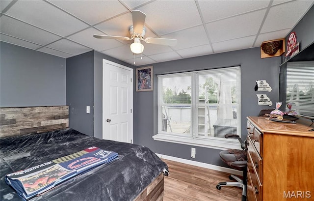 1866 Big Oak Dr, Troy, MO 63379 - bedroom with a paneled ceiling, wood finished floors, baseboards, and ceiling fan