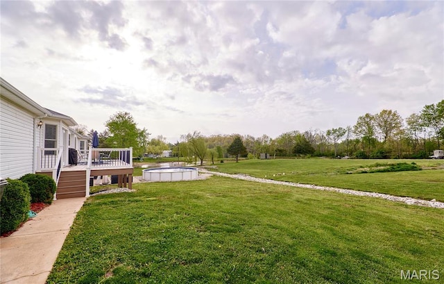 1866 Big Oak Dr, Troy, MO 63379 - view of green lawn featuring a wooden deck and an outdoor pool