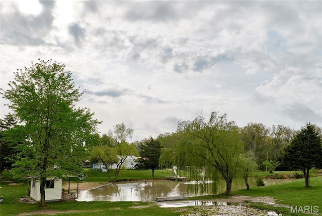 1866 Big Oak Dr, Troy, MO 63379 - surrounding community featuring a water view, a lawn, and an outdoor structure