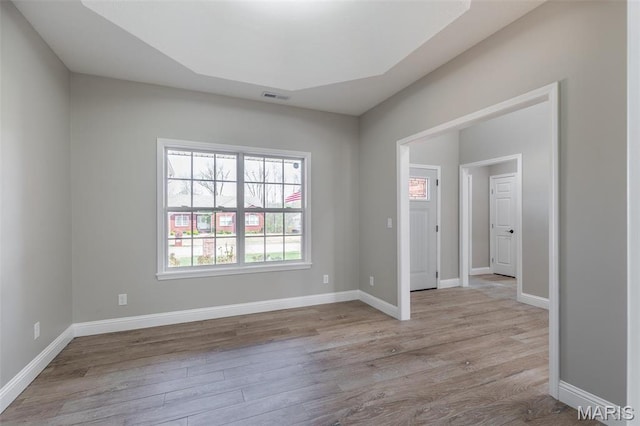 2940 Karmen Ln, Poplar Bluff, MO 63901 - spare room featuring wood finished floors and baseboards