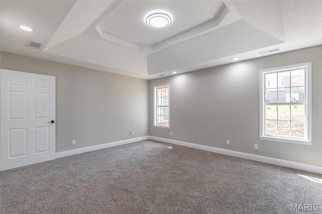 2940 Karmen Ln, Poplar Bluff, MO 63901 - empty room with a tray ceiling, carpet floors, baseboards, and recessed lighting