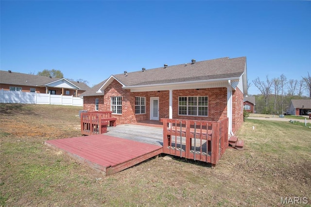 2940 Karmen Ln, Poplar Bluff, MO 63901 - rear view of property with brick siding, a wooden deck, and a shingled roof