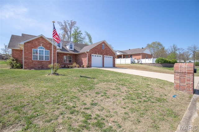 2940 Karmen Ln, Poplar Bluff, MO 63901 - view of front of house with a garage, driveway, and brick siding