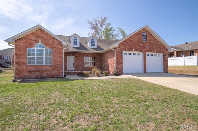 2940 Karmen Ln, Poplar Bluff, MO 63901 - view of front of home with a garage, driveway, and brick siding