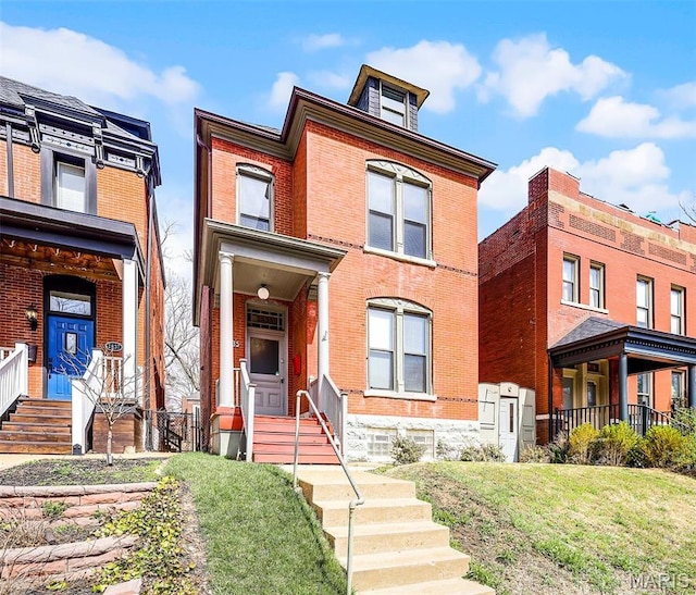 2835 Shenandoah Ave, Saint Louis, MO 63104 - view of front of house featuring brick siding and a front yard